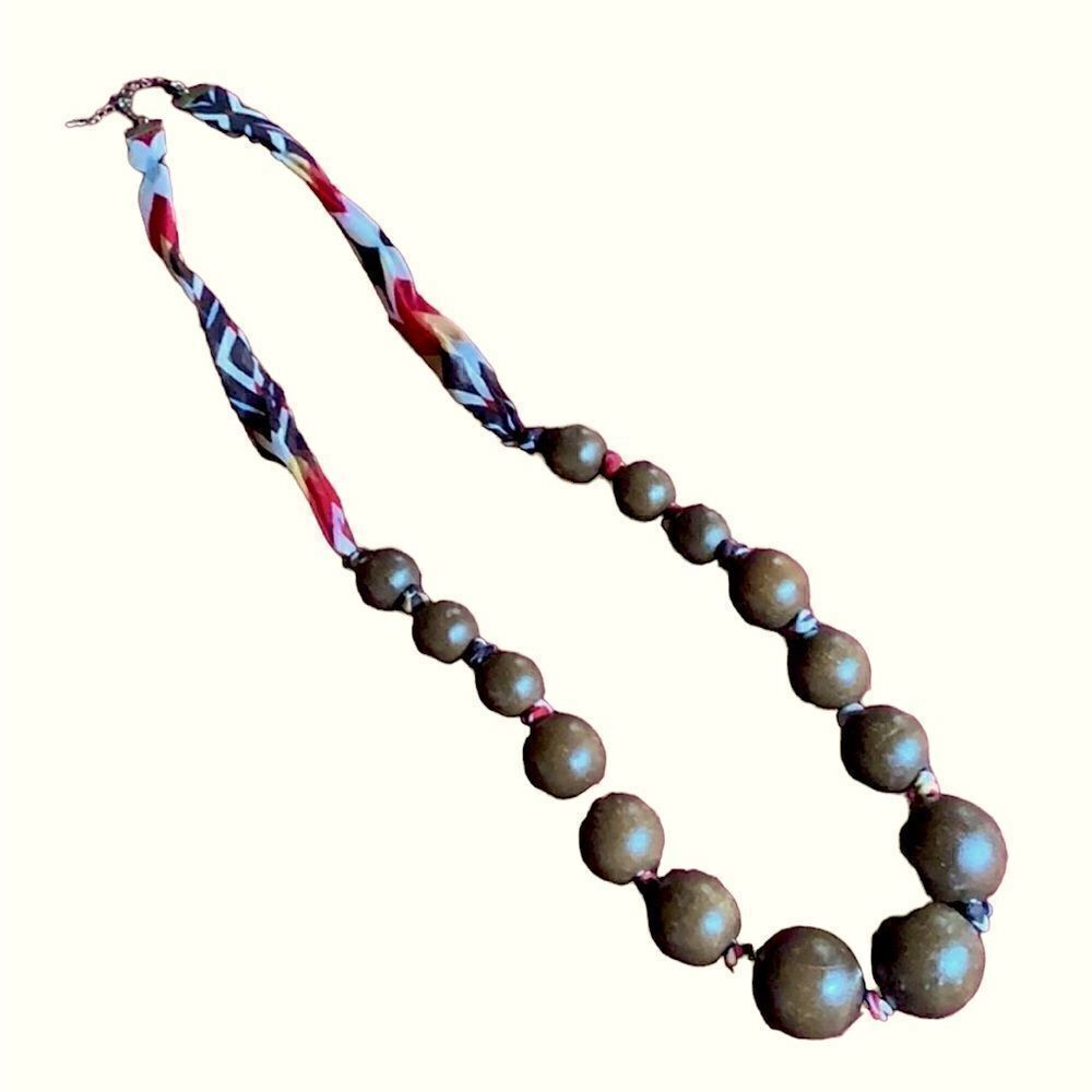 Marks and Spencer’s chunky wood and ribbon Necklace 35-38” long